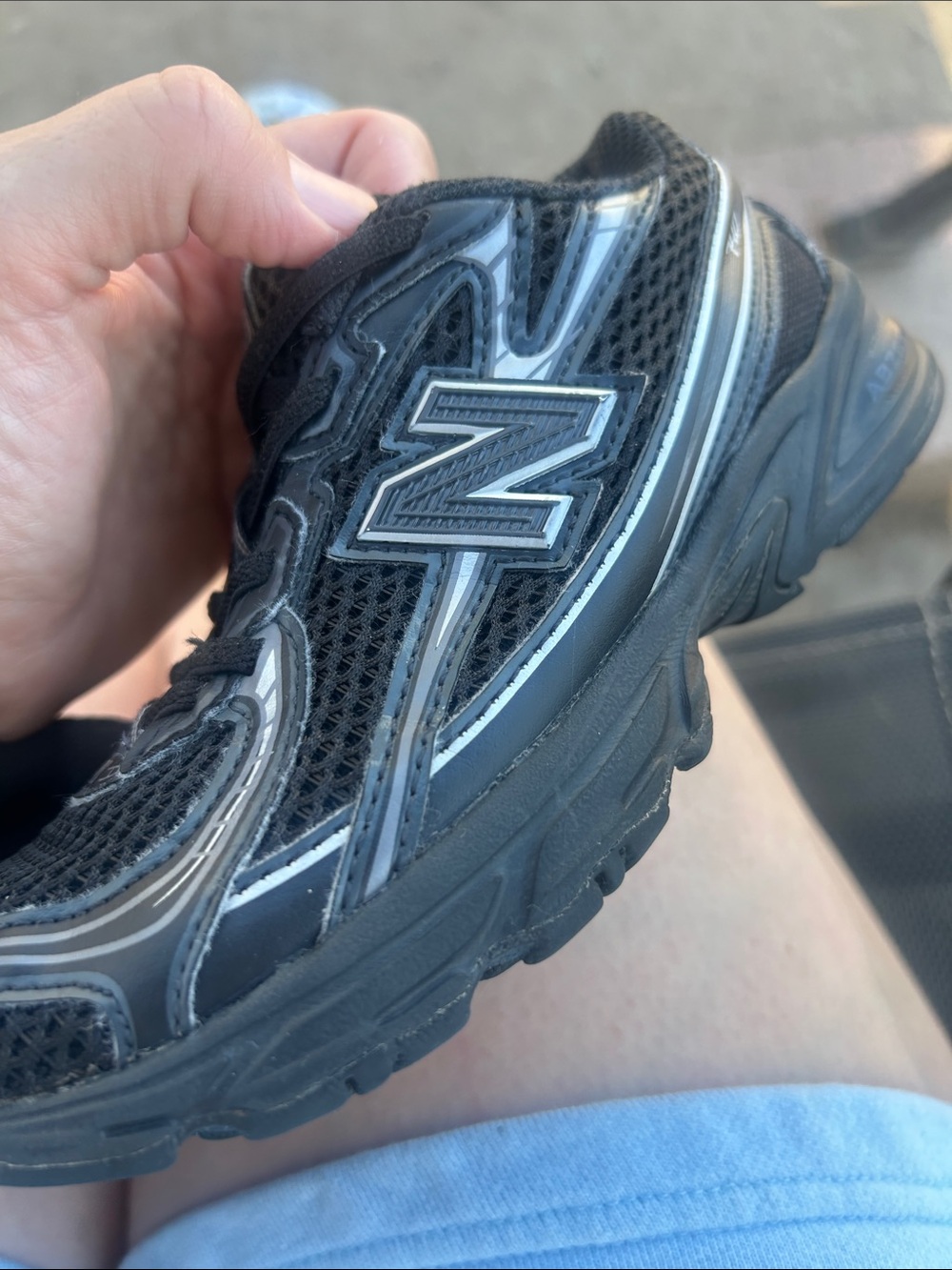 New Balance Kids Black and Silver Athletic Sneaker